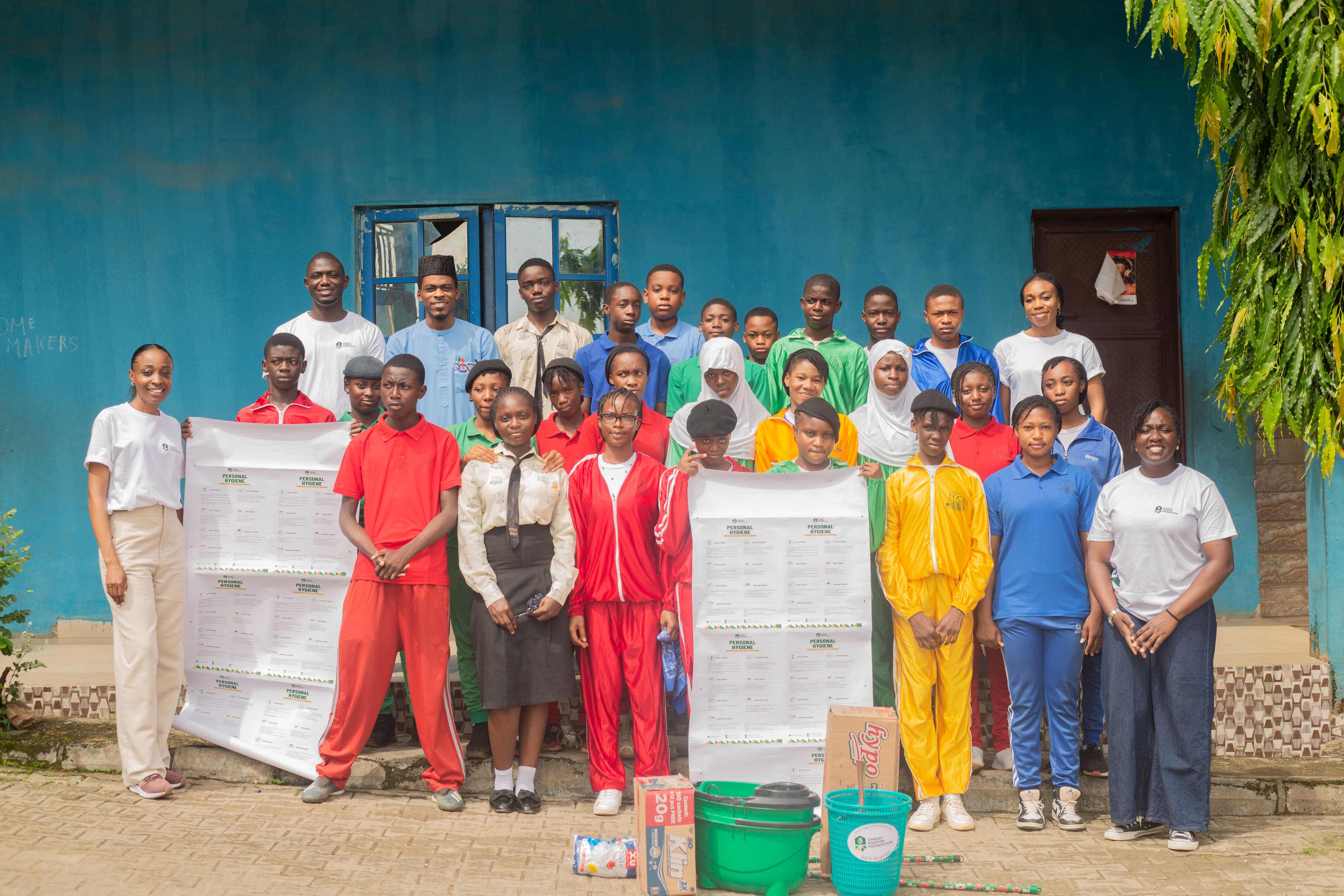 Students and CFO team celebrating a personal hygiene and community health outreach