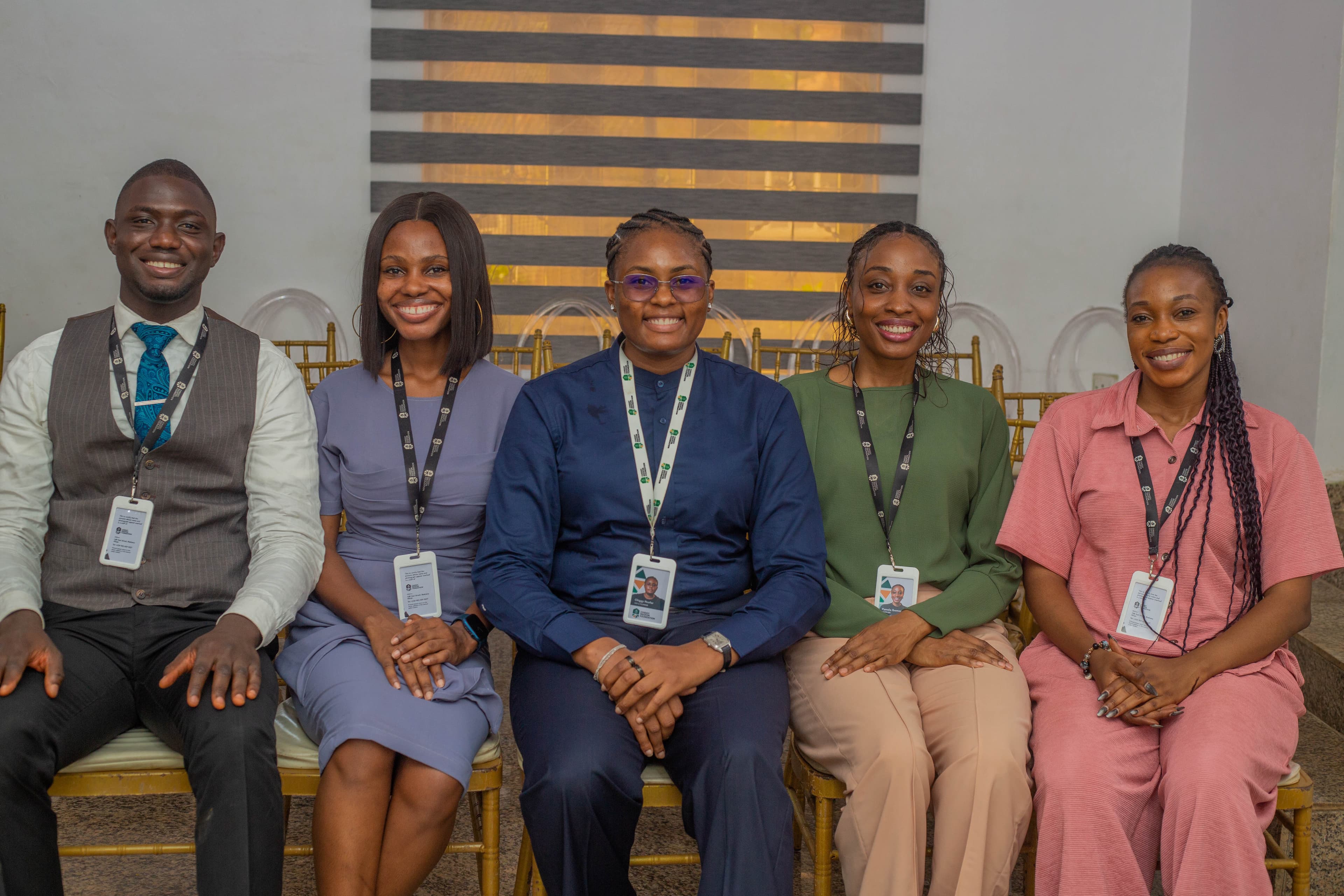 Chiggy Foundation for Opportunity team seated together in professional portrait