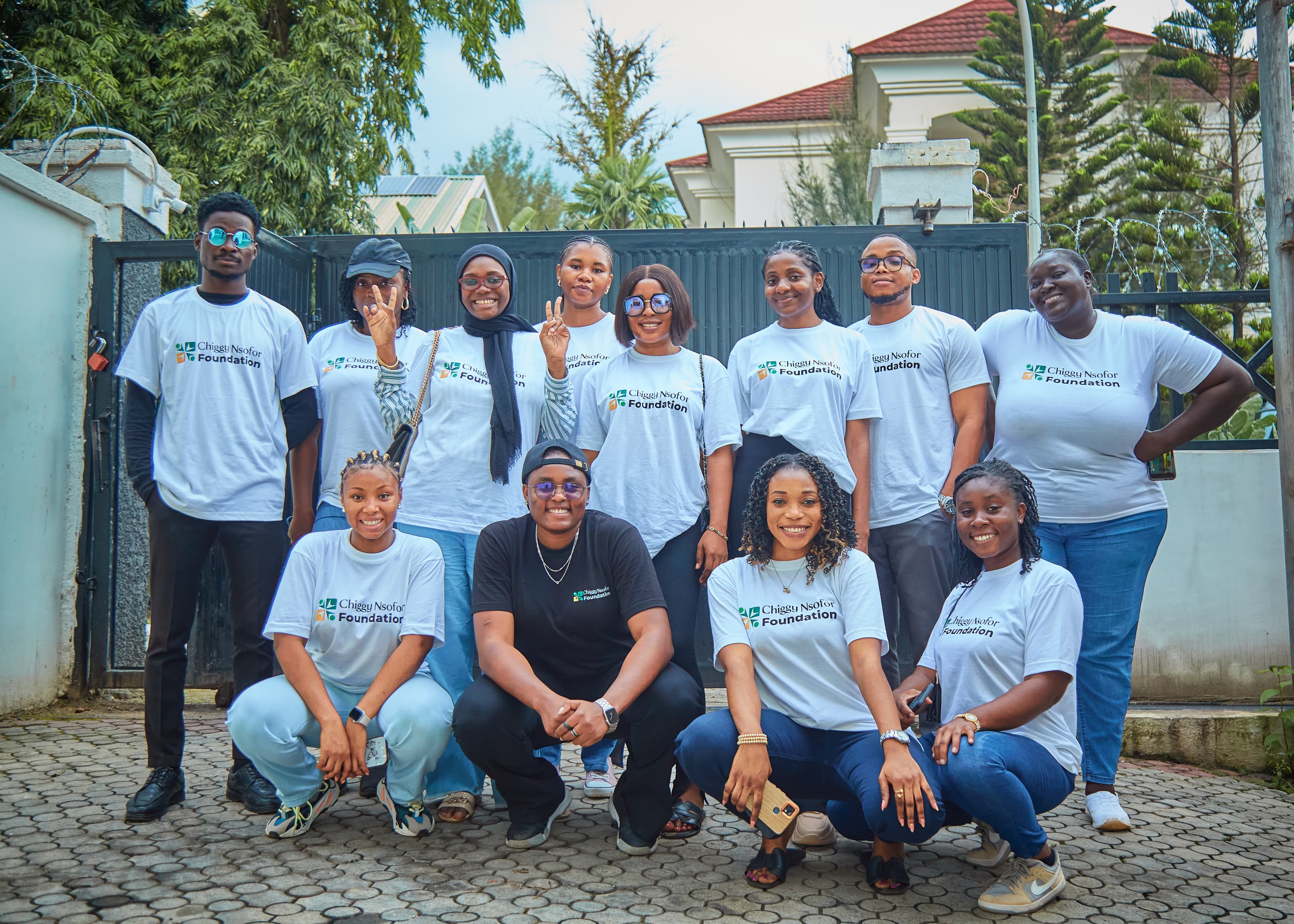 Chiggy Foundation for Opportunity volunteers in branded shirts at the training hub